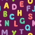 Funny children seamless pattern with color letters. Colorful alphabet on a lilac background.